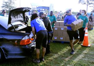 Treasure Coast Food Bank volunteers help to provide Thanksgiving meals to their neighbors in need.